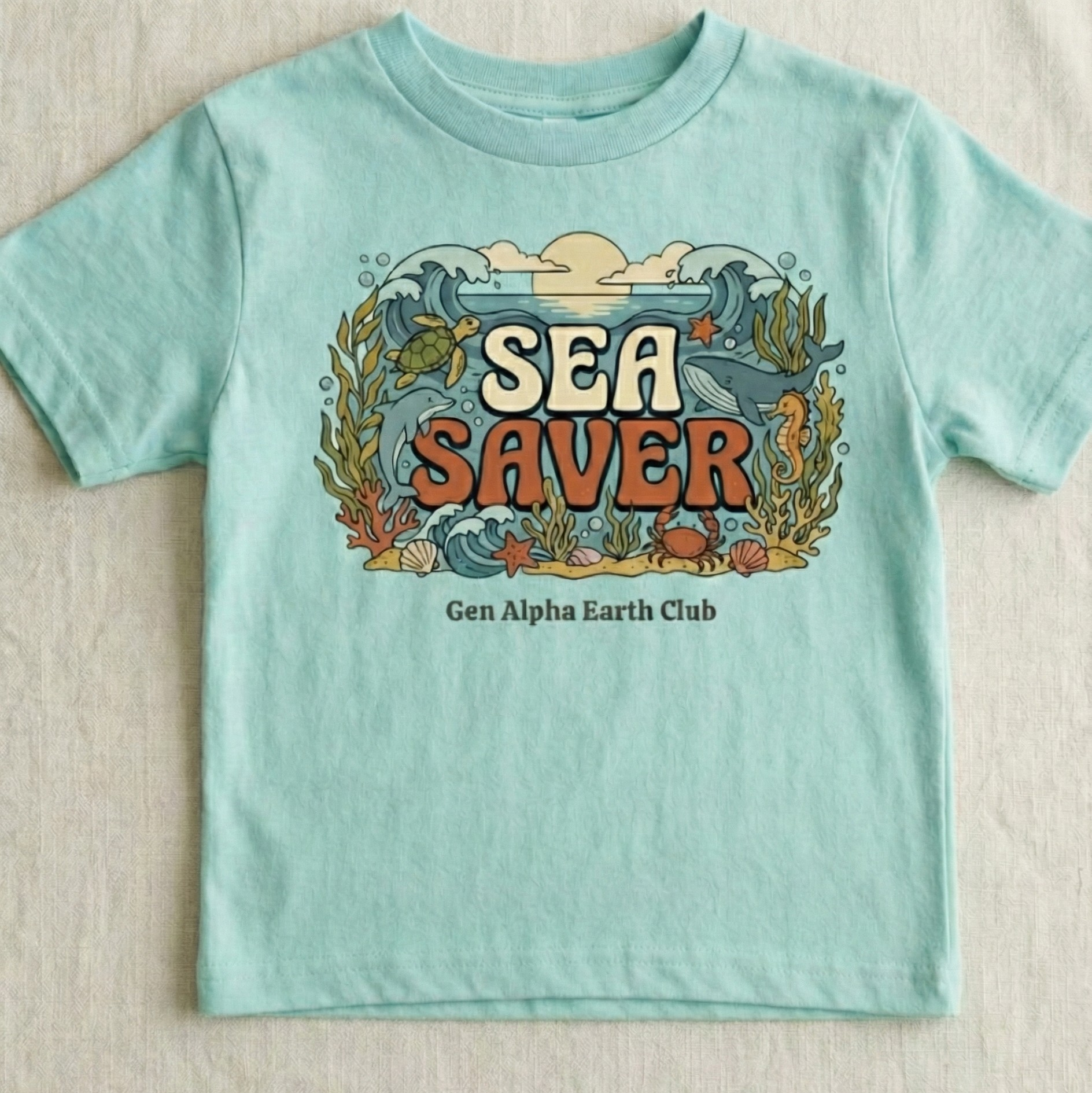 Toddler teal Sea Saver t-shirt made from soft cotton shown on a neutral background